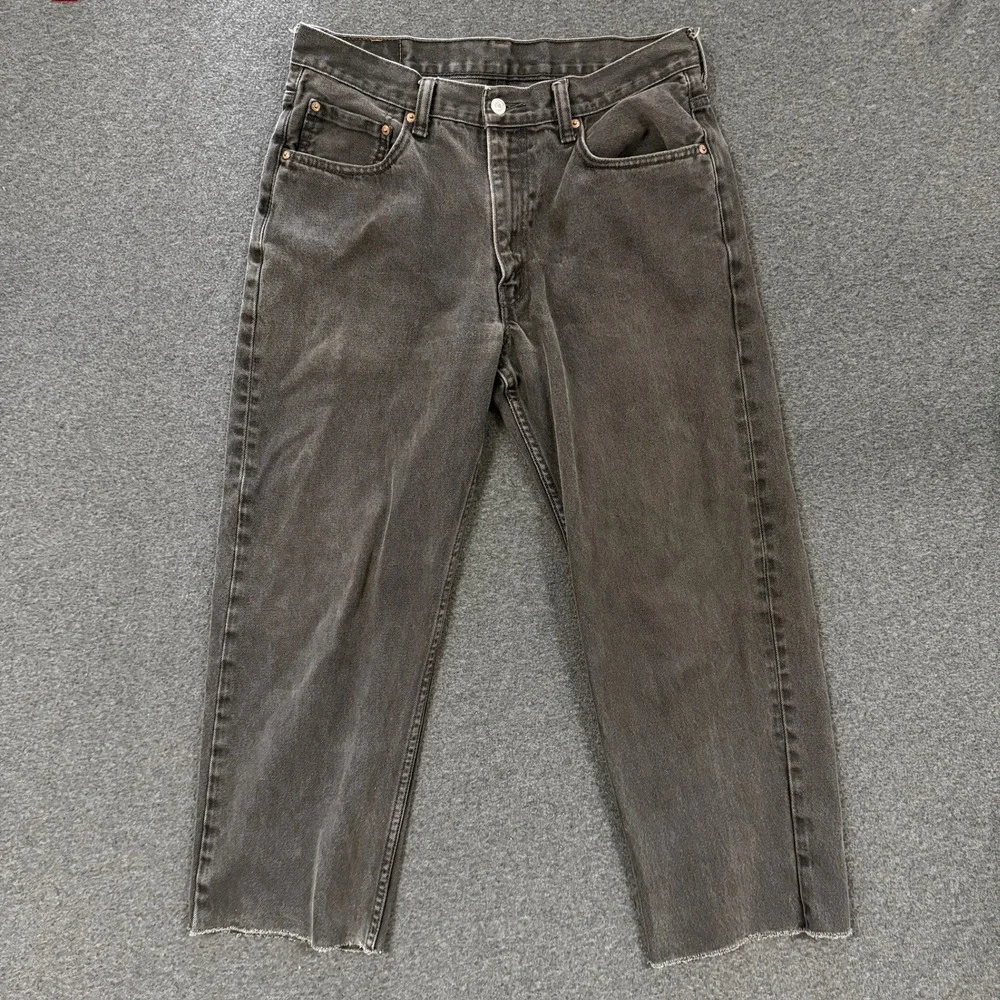 Vintage Levis 550 Relaxed Fit Jeans Mens 34x29 Black Good Raw Hem Cutoff Capri